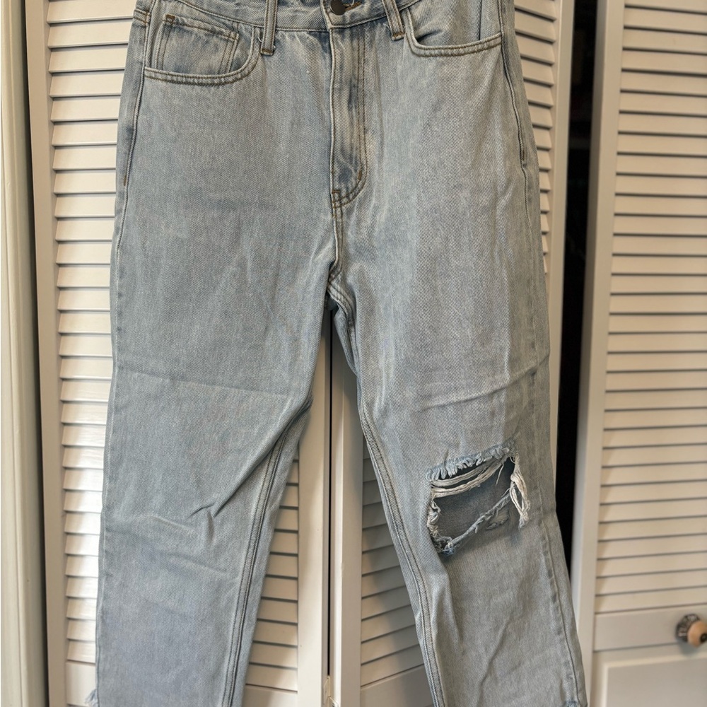 Women’s Light Blue Distressed Jeans